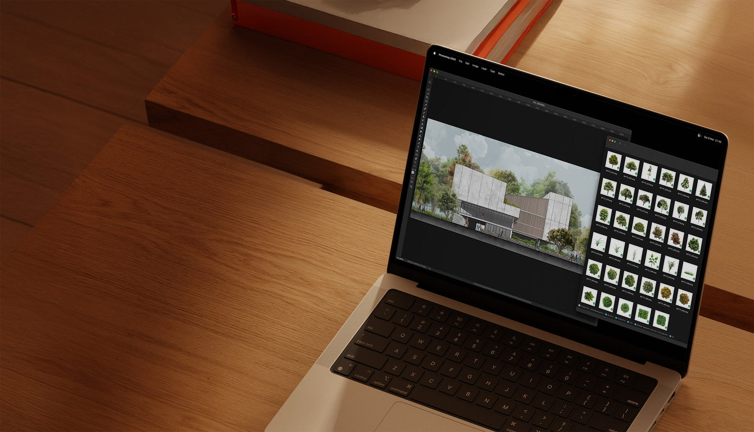 Laptop on a wooden surface with a design software open on the screen